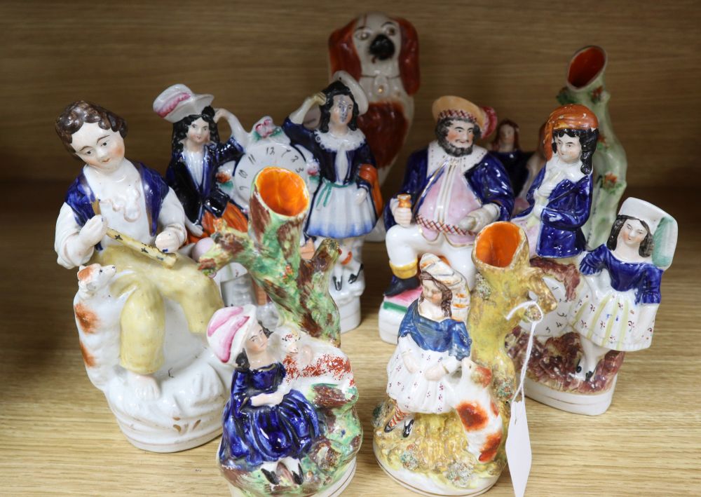 A Staffordshire pottery King Charles spaniel and seven various pottery figures and groups (8)